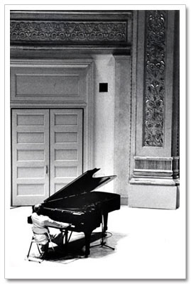 Sri Chinmoy playing piano